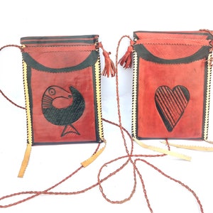 Two Fulani Leather Wallet .(For holding ,Items like Passport,Phone , Cigarettes,Money and other Important cards)
