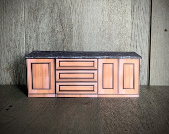 Kit de papel para montar armários de cozinha modernos em escala 1:12 para casa de bonecas, incluindo bancadas. Arquivos PDF para download.