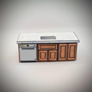 May include: A white countertop with a brown wood cabinet base. The countertop has a small sink and a white dishwasher with a control panel. The cabinet base has four doors with a wood grain pattern.