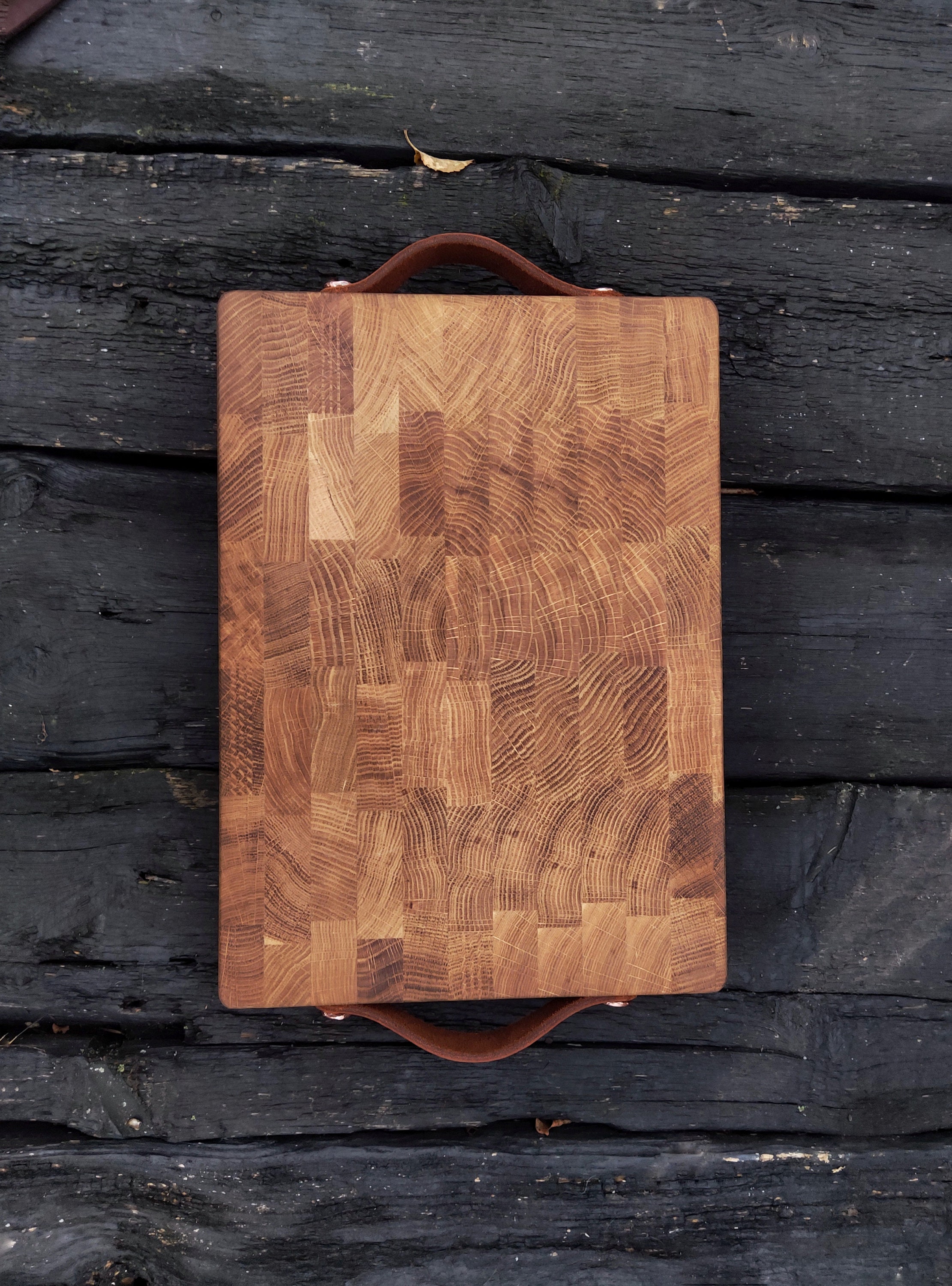 Organic Shape Cutting Board with Leather Loop Attached to Handle