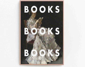 May include: A rectangular wall art print in a thin pink frame featuring a painting of a person in a white lace dress sitting in a chair and reading a book. The word BOOKS is printed in large white capital letters three times over the image.