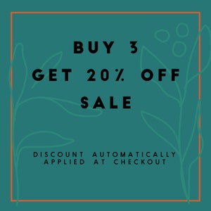 May include: A teal square graphic with an orange border featuring black text that reads BUY 3 GET 20% OFF SALE and DISCOUNT AUTOMATICALLY APPLIED AT CHECKOUT. The design includes light green line art of leaves on the left and right sides.
