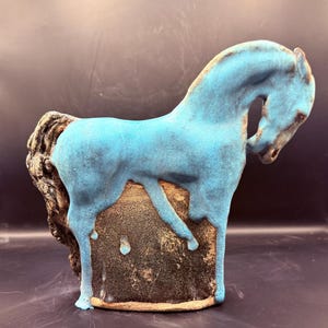 Black and blue ceramic horse sculpture