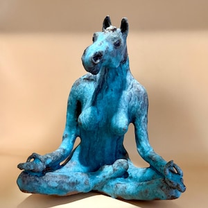 Om: Horsewoman sitting in half-lotus meditating ceramic sculpture