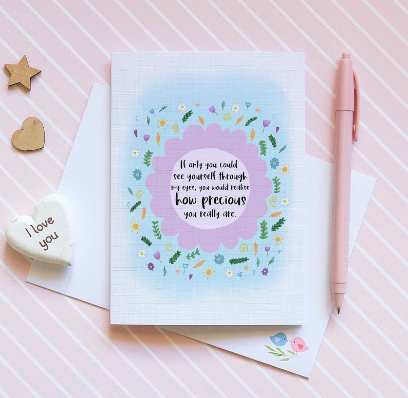 May include: A light blue and purple card with a floral border and the text "If only you could see yourself through my eyes, you would realize how precious you really are."