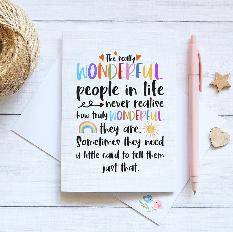 May include: A white greeting card with a grid pattern featuring the text: The really WONDERFUL people in life never realise how truly WONDERFUL they are. Sometimes they need a little card to tell them just that. Includes colorful hearts, a rainbow, and a sun.