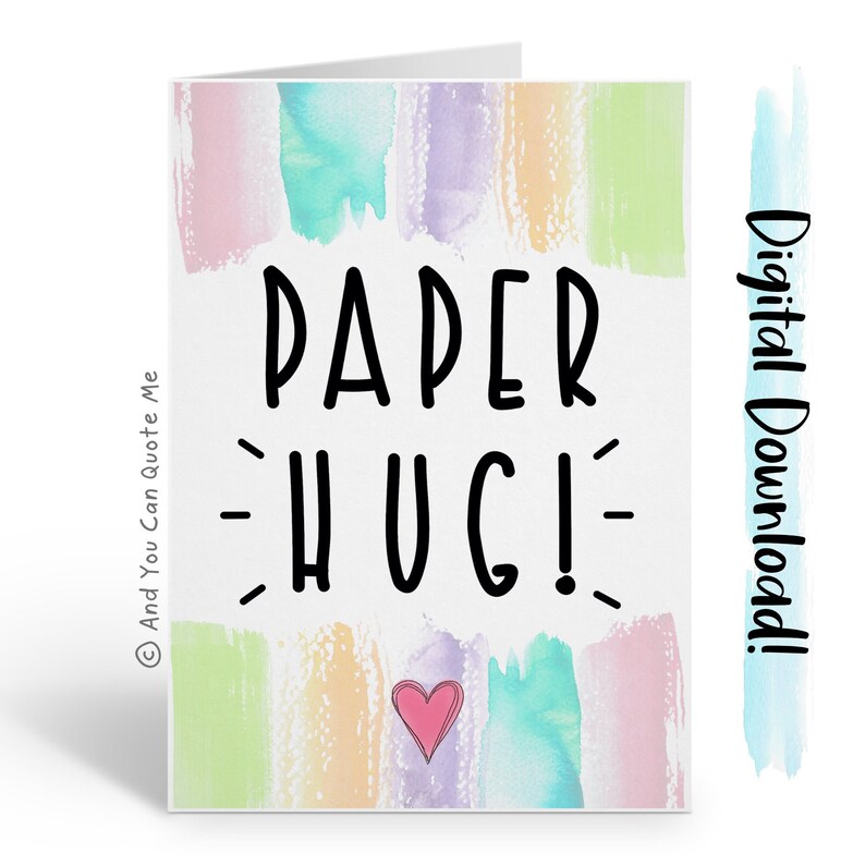 May include: A digital download of a printable card with a watercolor background in shades of pink, blue, green, and yellow. The card says "PAPER HUG!" in black text with a small pink heart at the bottom.