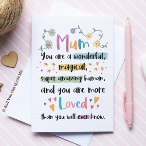 May include: A colourful card with the word "Mum" in a floral design. The card reads "You are a wonderful, magical, super amazing human, and you are more Loved than you will ever know."