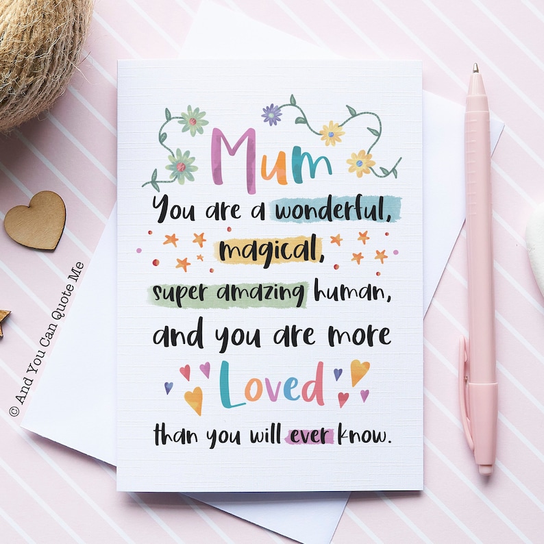 May include: A colourful card with the word "Mum" in a floral design. The card reads "You are a wonderful, magical, super amazing human, and you are more Loved than you will ever know."