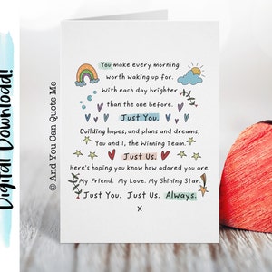May include: A white card with a handwritten message about love and friendship. The card features a rainbow, a sun, clouds, stars, and hearts. The text reads: "You make every morning worth waking up for. With each day brighter than the one before. Just You. Building hopes, and plans and dreams, You and I, the winning Team. Just Us. Here's hoping you know how adored you are. My Friend. My Love. My Shining Star. Just You. Just Us. Always. X"