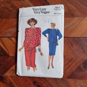 May include: A sewing pattern for a dress with a long sleeve and a tie at the waist. The pattern is called "Very Easy Very Vogue" and the pattern number is 9314. The size is 8-10-12.