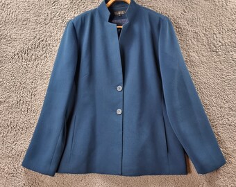 May include: A dark blue blazer with a mandarin collar and three buttons. The blazer is made of a smooth, textured fabric.