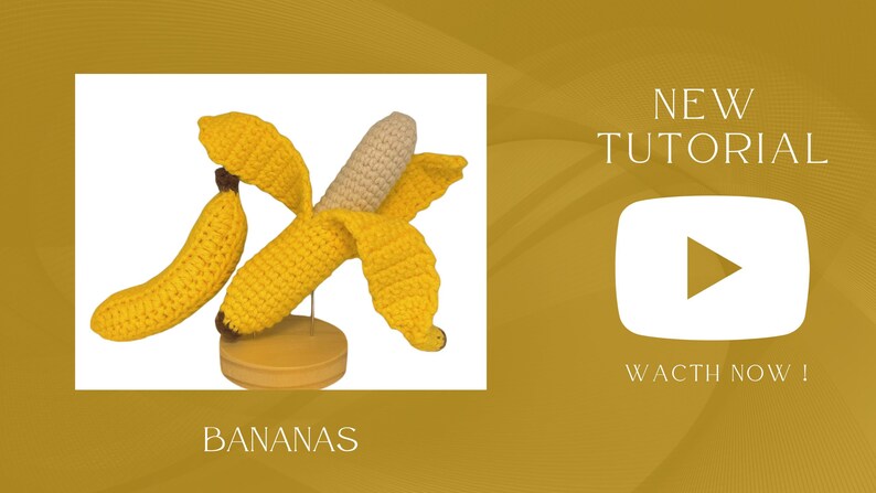May include: Two crocheted bananas, one with a peel, on a wooden stand. The image is a thumbnail for a YouTube video tutorial on how to crochet bananas.