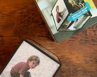 Vintage photo cube rotating picture frame. Hold six 3.875 square photos.
