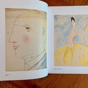 May include: Two black and white drawings on a white background. The drawing on the left is a profile of a person's face. The drawing on the right is a person with long legs and arms, wearing a hat and stockings, standing on a yellow circle.