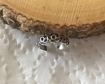 Pendiente de flor de plata de ley