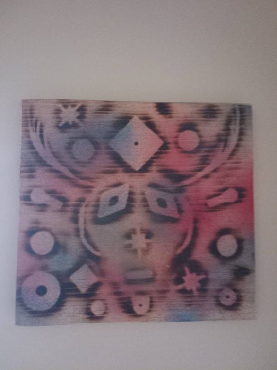 Handmade wall art for anyone who's likes weird street art. Hand cut burnt and painted by a local artist. One if a kind.