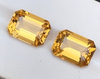 11.50 Carats Outrageous Custom Emerald cut Citrine Pair. Size: 13x9x6.8 mm.