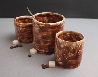 Handmade chocolate brown ceramic mugs patterns