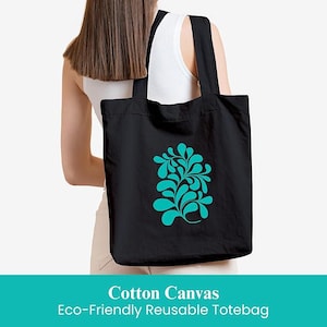 May include: Black cotton canvas tote bag with a teal floral design.  The tote bag is eco-friendly and reusable.