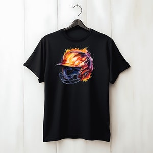 May include: Black t-shirt with a graphic of a baseball helmet engulfed in flames. The helmet is blue and white with a black cage. The flames are orange, yellow, and red.