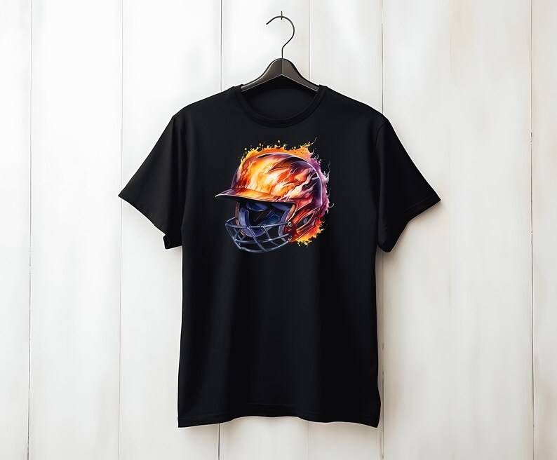 May include: Black t-shirt with a graphic of a baseball helmet engulfed in flames. The helmet is blue and white with a black cage. The flames are orange, yellow, and red.