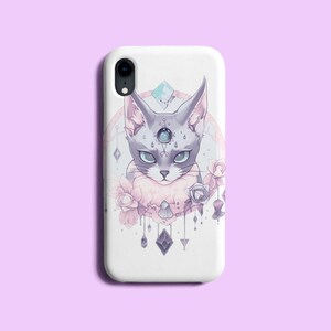 May include: White phone case featuring a design of a grey cat with a third eye and a floral pattern in pink and purple.