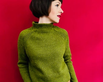 Knitting instructions for a classic short sweater with raglan sleeves and stand-up collar