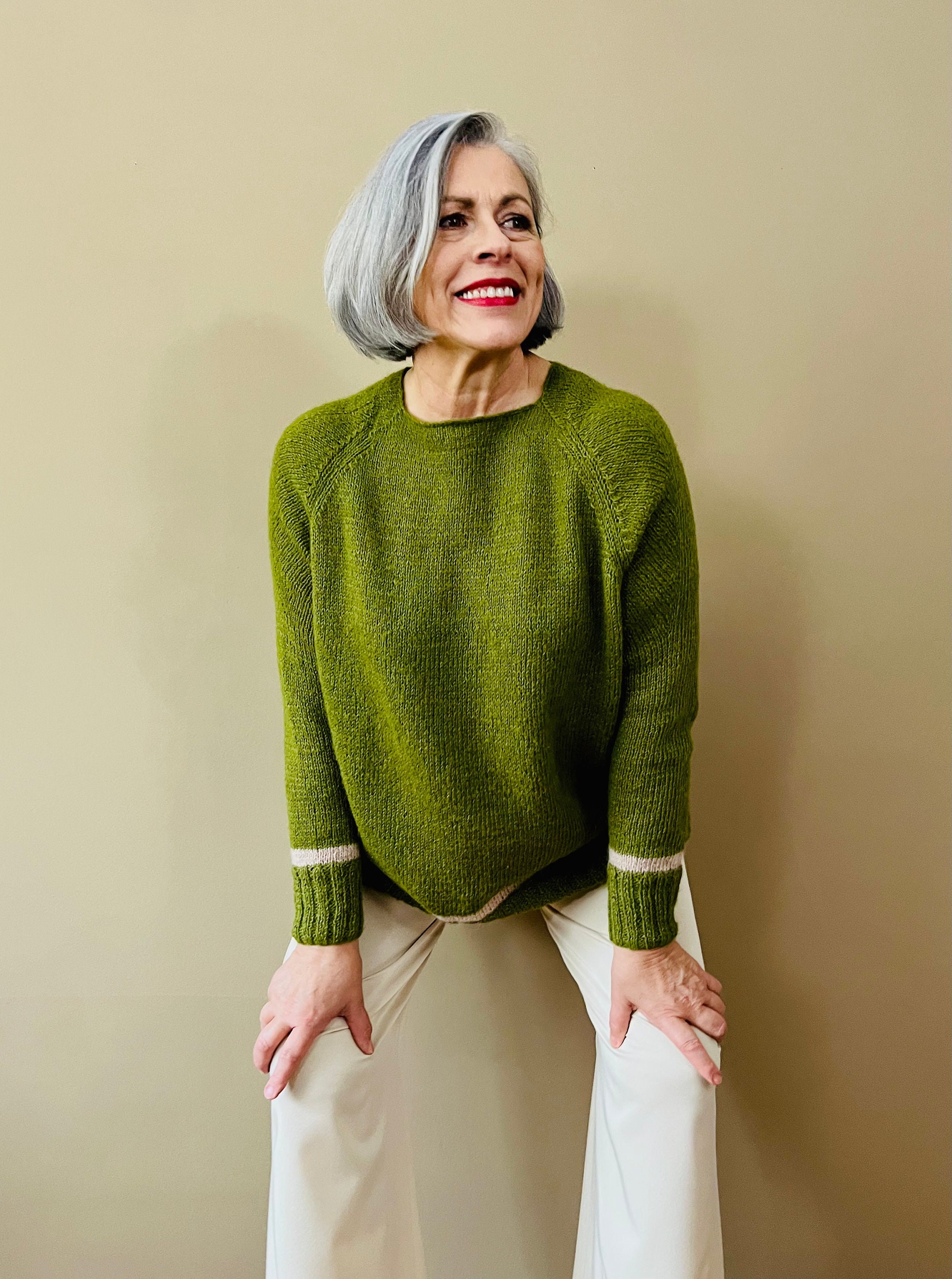 Knitting Pattern: Trendy Sweater with Striking Color Accents and Unique Neckline