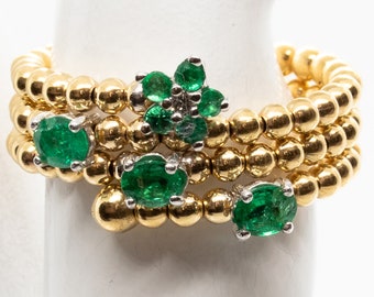Anillo de oro amarillo de 18 kt con esmeraldas y diamantes, anillo multivueltas, anillo de compromiso, anillo "Sheila"