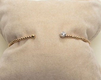 „Promessa“-Armband aus 18-karätigem Gelbgold und Weißgold mit Diamant, einreihiger starrer Armreif, starres Armband, Kreisarmband
