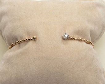 Pulsera "Promessa" en oro amarillo y blanco de 18 kt con diamante, brazalete de una sola vuelta, brazalete rígido, brazalete de aro