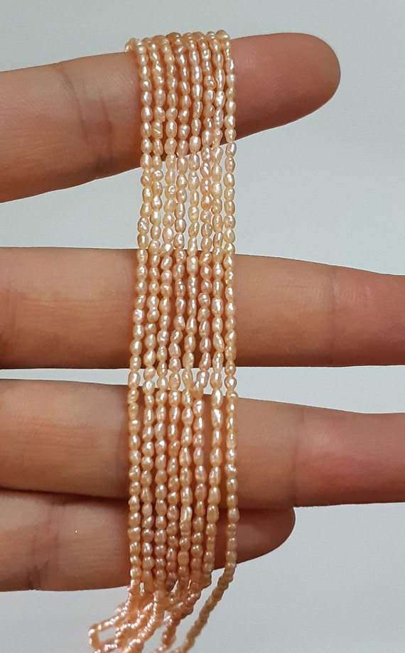 1-2mm Rice seed pearls, cultured freshwater small pearl strand, natural  colour peach oval shape tiny pearl bead wholesale PB732