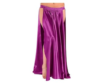 May include: A long, flowing skirt in a vibrant purple hue. The skirt features high slits on both sides, creating a dramatic and elegant silhouette. The fabric has a silky sheen, suggesting a satin or similar material.