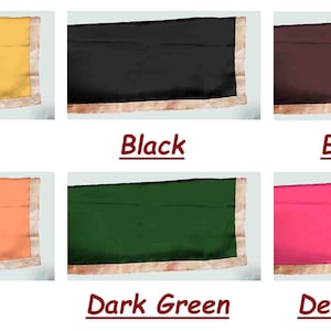 May include: Six fabric swatches in different colors: beige, black, brown, coral, dark green, and deep pink. Each swatch has a gold trim.