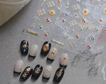 ゴールドフォイルクリスタルネイルステッカー - 天体モチーフの太陽と月のネイルデカール