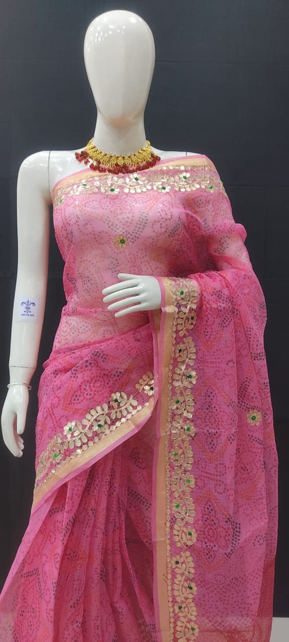 Brilliant Kachhi Silk Saree With Weaving Work In Cream Color