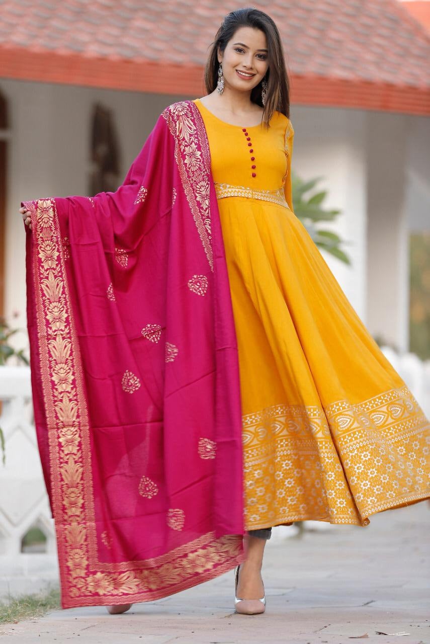 yellow gown with pink dupatta