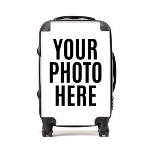 May include: White suitcase with black wheels and handle. The suitcase has the text "YOUR PHOTO HERE" printed on the front.