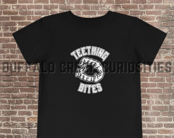 Teething Bites Vampire Teeth Horror Goth Alt Baby Little Bat Halloween Spooky Mama Toddler Short Sleeve Tee