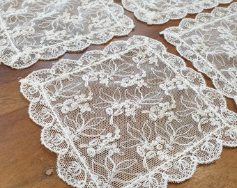 Set of four embroidered cotton net Doilies /coasters