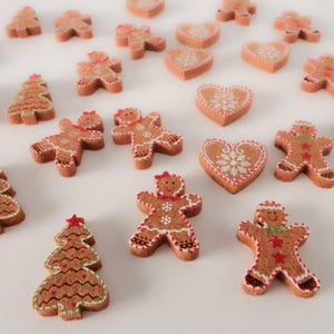 May include: A collection of festive gingerbread-themed decorations. The image features gingerbread men, Christmas trees, and heart-shaped cookies, all decorated with white icing and colorful accents. These holiday ornaments are perfect for seasonal decor.