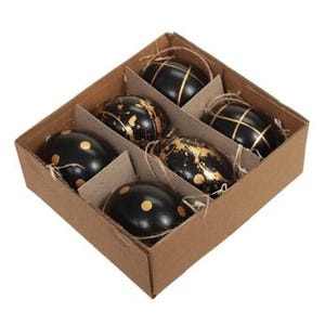 Könnte beinhalten: Sechs schwarze Ostereier mit goldenen Akzenten in einer braunen Pappbox. Die Eier haben verschiedene Muster, darunter Punkte, Streifen und Spritzer.