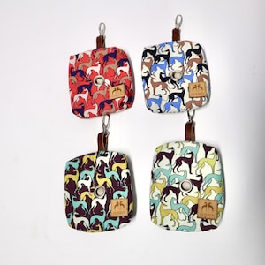 Dog poop bag dispenser