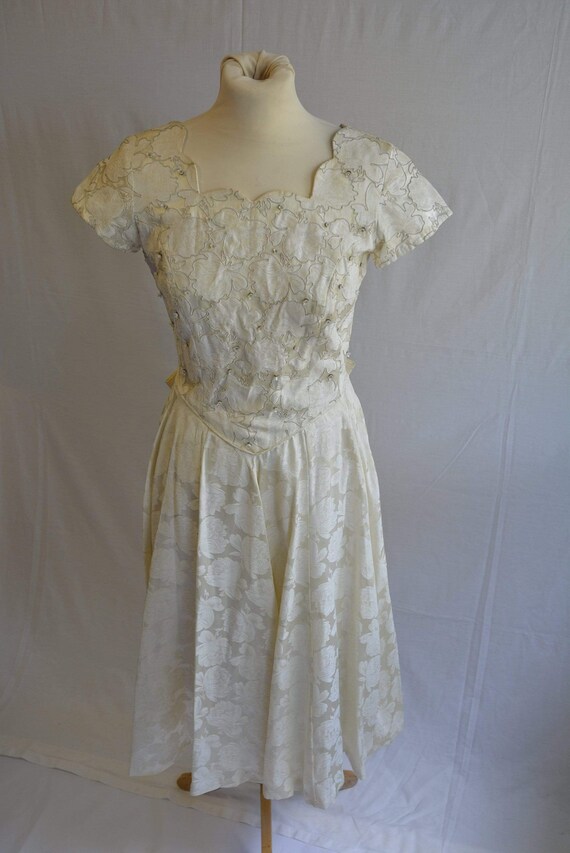 Stunning vintage 1950s brocade beaded dress