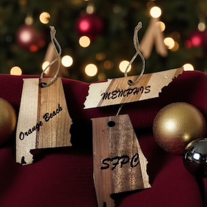 Personalized State Outline Christmas Tree Ornaments Made From Hardwoods Laser Engraved With Your City Or Zip Code