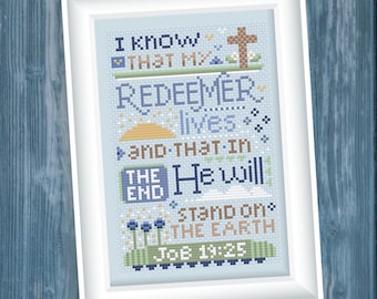 May include: Cross stitch pattern with blue and brown embroidery floss on a light blue background. The pattern features a cross, flowers, and the text "I know that my Redeemer lives and that in the end He will stand on the earth Job 19:25".