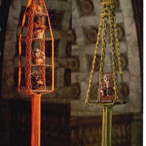May include: Two macrame hanging shelves, one orange and one green. The orange shelf has three tiers and is decorated with dried flowers and a bird's nest. The green shelf has one tier and is decorated with a small framed picture. Both shelves have long tassels hanging from the bottom. "Petit Bouquet" and "Printemps" are written below the shelves, with page numbers.