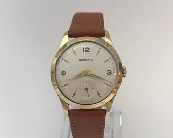 GARRARD Gents 9ct Gold Vintage Wristwatch in Original Box. Hallmarked London 1965. In as new condition. REF No. 263