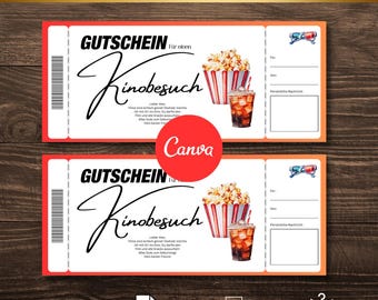 May include: A printable movie ticket gift certificate with a red and orange background. The certificate features a cartoon illustration of popcorn and a drink in a red cup. The text on the certificate reads "KINO GUTSCHEIN" and "GUTSCHEIN For einen Kinobesuch".